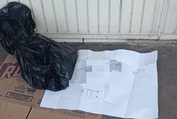 Abandonan cabeza de cerdo con un mensaje, frente a escuela de Uruapan