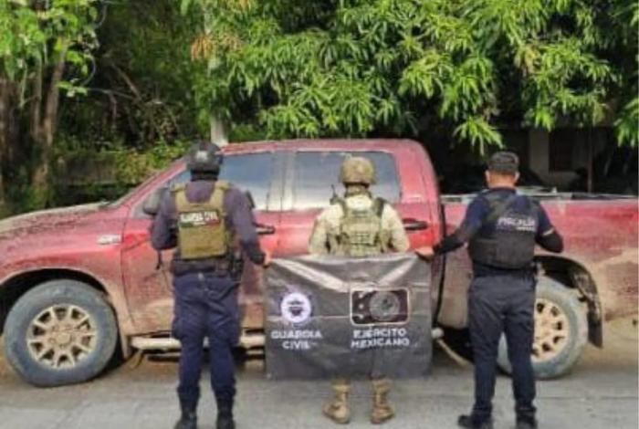 Agentes estatales y federales aseguran en Apatzingán camioneta robada con municiones y droga: SSP