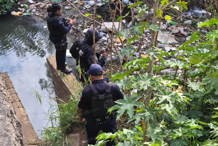 Encuentran un cu3rpo en canal de Zamora