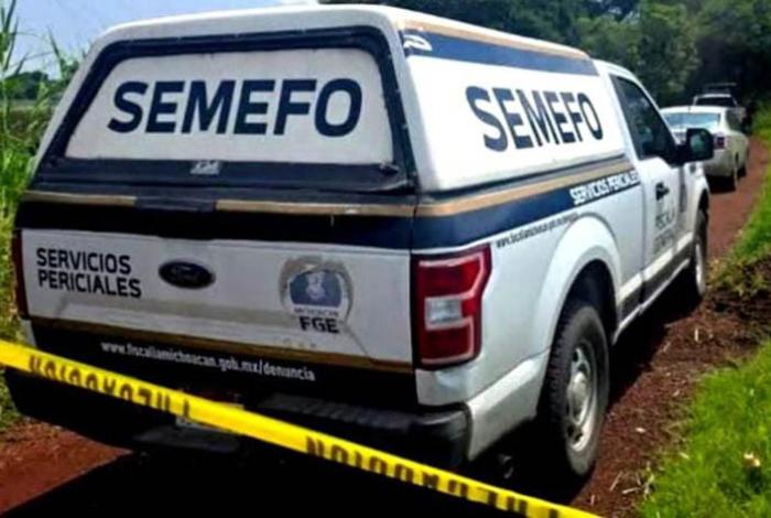 Localizan a un hombre asesinado en un platanal, en Coahuayana