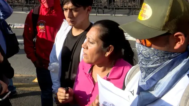 Mi hijo fue torturado, asegura madre de normalista vinculado por homicidio